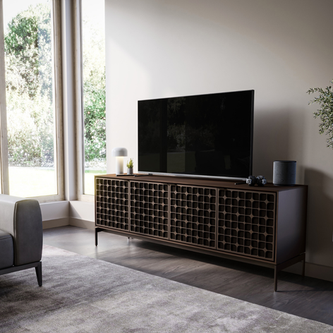star pattern media cabinet, with a tv resting on top.